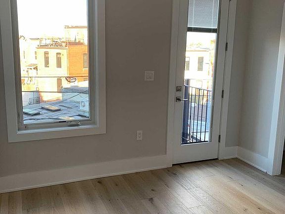 Bedroom 1 overlooks parking and LeDroit Park