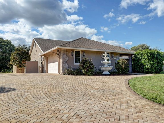3rd image of 2670 NE Pinecrest Lakes Blvd