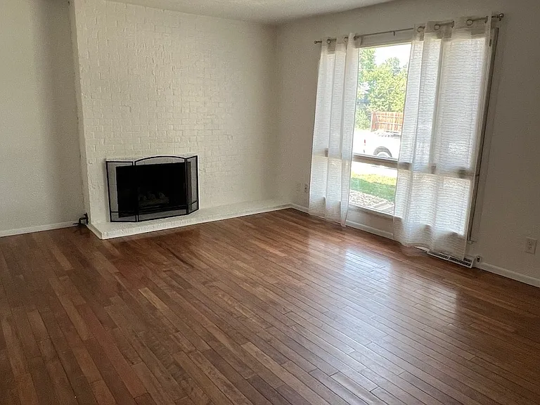 Main Living room, fireplace and tons of natural light.