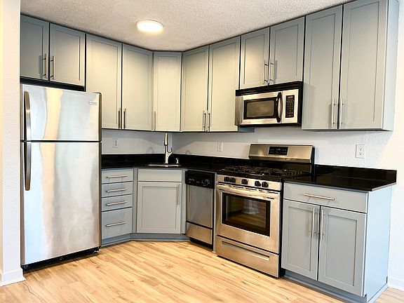 Kitchen with two tone adjustable lights.