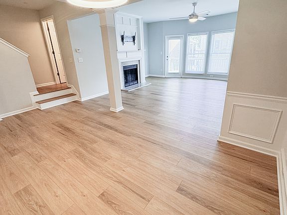 New light fixtures throughout. Dining area.