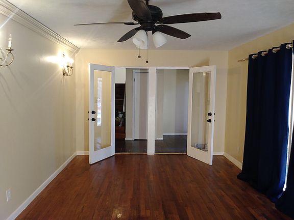 FRONT ROOM/LIVING ROOM (NEAR FRONT DOOR) WITH BEAUTIFUL HARDWOOD FLOORS