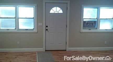 Front door view from living room
						:
						newly framed