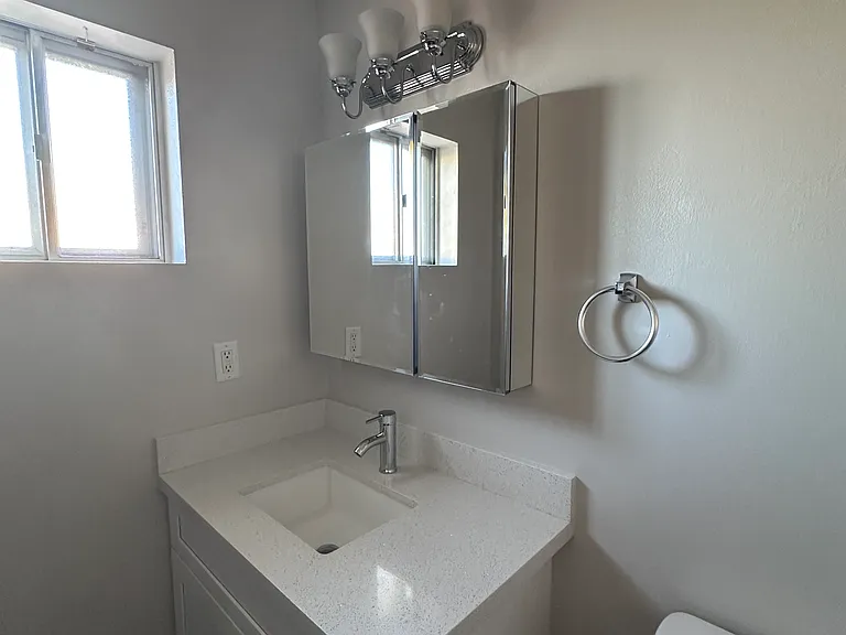 Master bath, new cabinet, sink, medicine cabinet