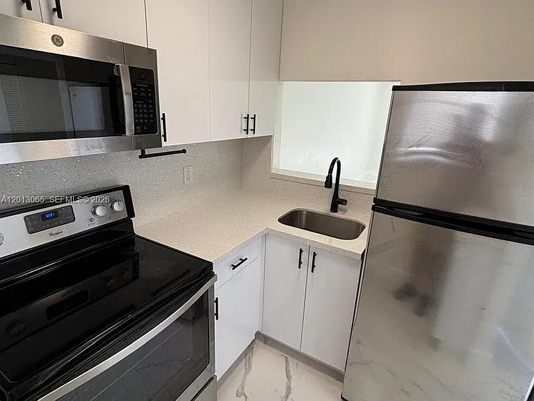 4298 NW South Tamiami Canal Dr #4 — Photo 5
