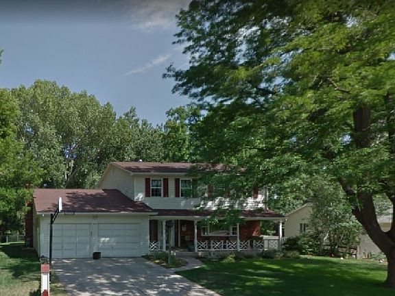 Shaded front yard and porch.