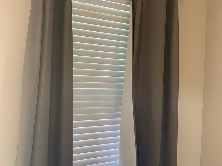 Energy Efficient windows
Double panel, faux wood blinds, and blackout curtains included