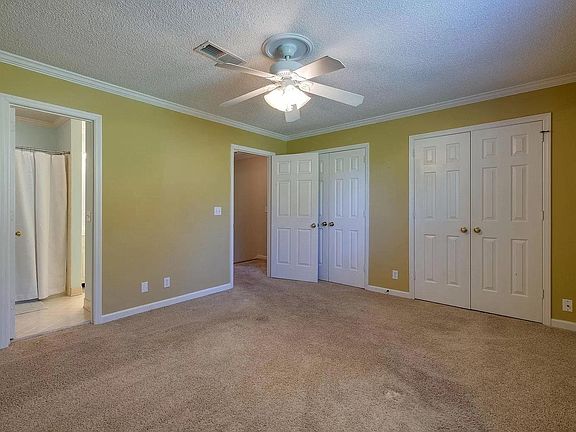 Bedroom #1 with attached full bathroom (bathroom has another entrance for the other bedroom).