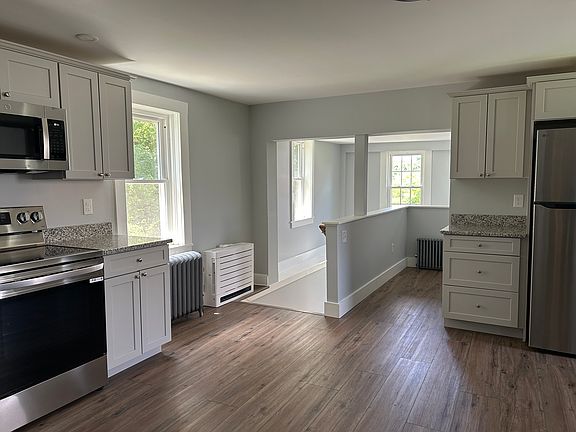 Kitchen - stairs at left exit to back door
16-1/2' x 17'