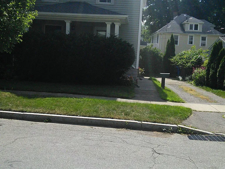 Driveway accommodates 2 vehicles. Private driveway