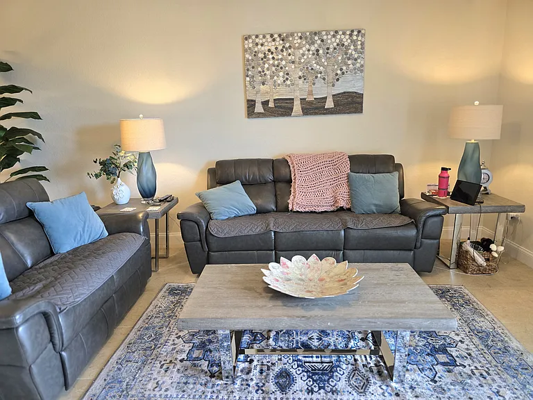 Living room has plenty of room for comfy furniture.