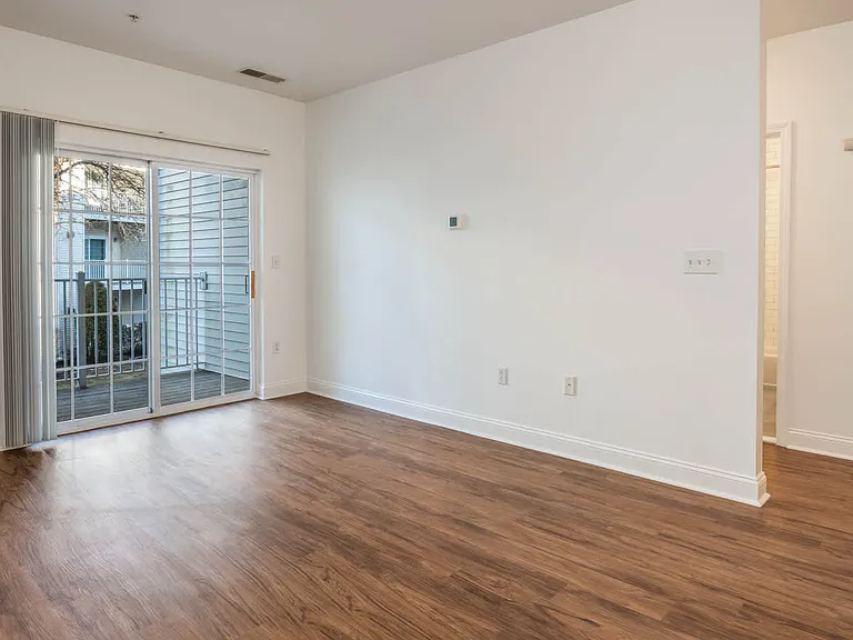 Living Room with Balcony and Hard Surface Flooring
