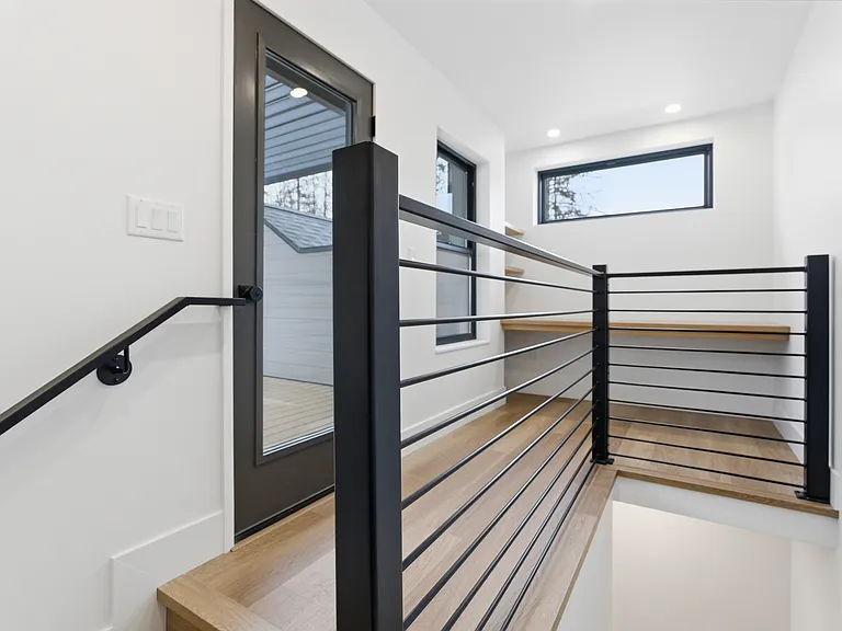 third floor area with built in desk