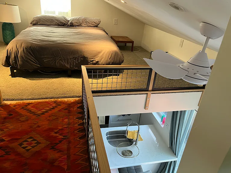 bed & upstairs and separate from living area