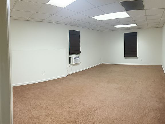 large Master Bedroom
has window unit for additional cooling feature.