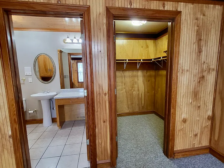 Apt 2D - 2nd bedroom featuring large walk-in closet and full-size bathroom.