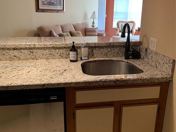 2nd image of 3470 Pinewalk Dr N APT 226