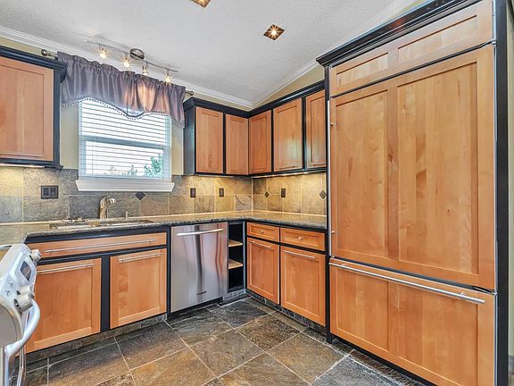 HUGE BUILT-IN GE MONOGRAM REFRIGERATOR