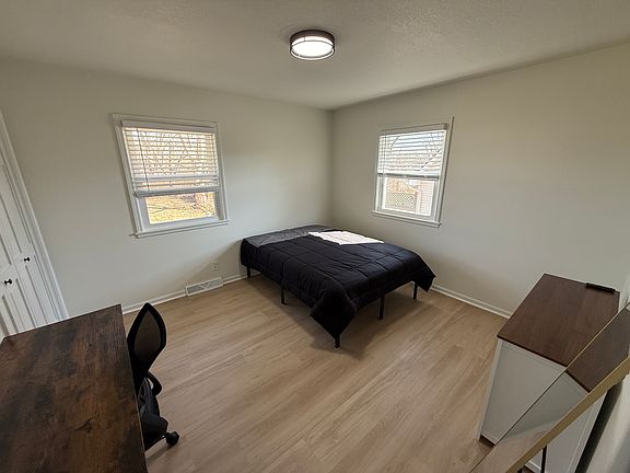 Full size bed w/ linens, desk, dresser, stand up mirror, night stand and smart TV in each room