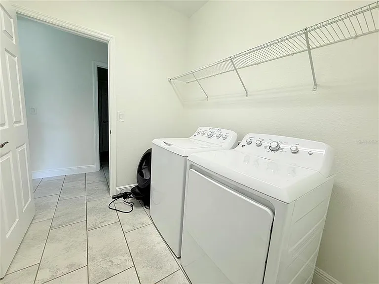 5057 NW 35th Pl — Photo 24