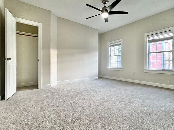 Master bedroom. All bedrooms are HUGE, equally sized with brand new carpet and LED ceiling fan. Each bedroom comes with a closet.