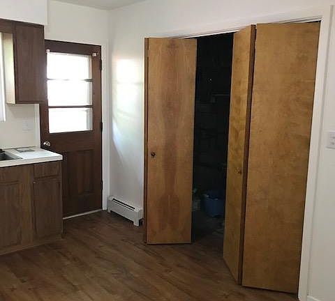 Kitchen, bi-fold doors is where washer & dryer hook up is located.