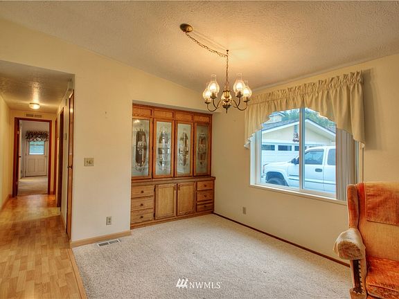 Dining room with built in cabinets. 