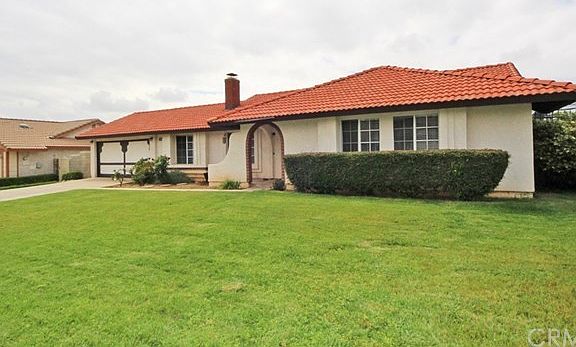 Healthy front and back lawns.