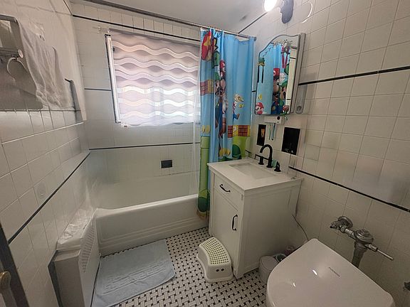 5th image of 209-02 42nd Ave #1