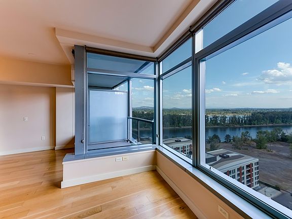 The Balcony and river view from the main room.