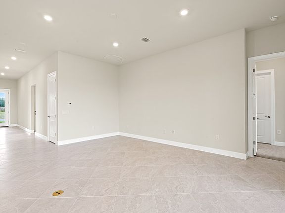 Gathering room with tile floors, perfect for entertaining