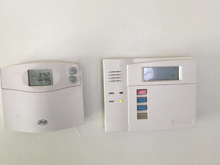Central heat and air with alarm system