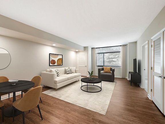Updated Finishes living and dining area with hard surface flooring