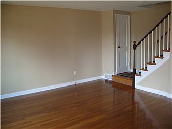 Living room with gleaming hardwoods