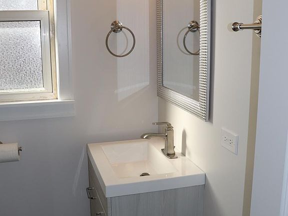 Bath with shower