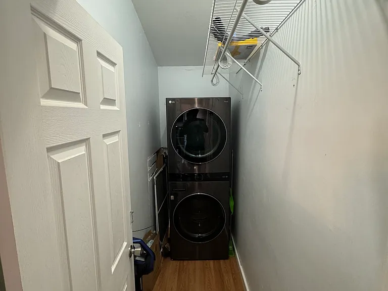 Stackable washer and dryer in unit.