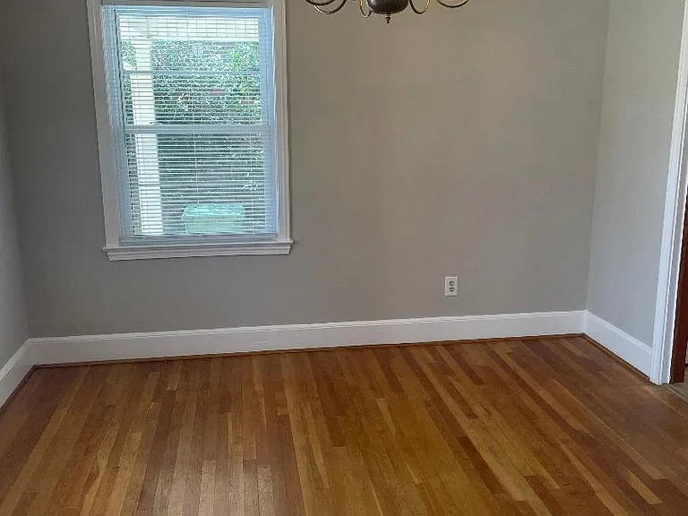 Dining room with dimmer light fixture