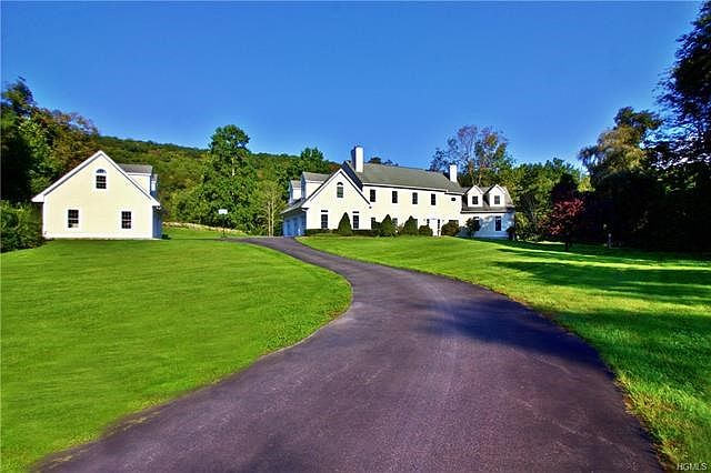Exquisite colonial home on estate setting.