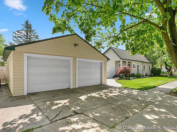 Detached 2-stall Garage and west side of house