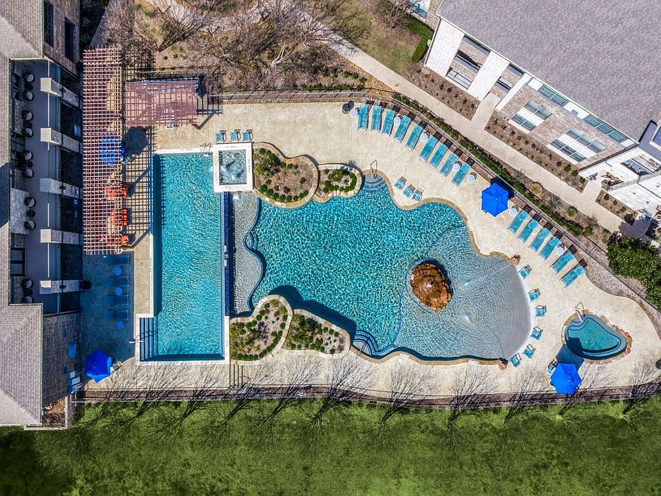 Gorgeous resort-style swimming pool with cabanas