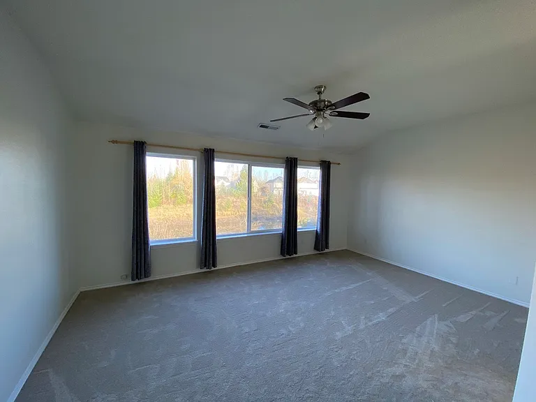 Bedroom #1: Master bedroom with wall of windows