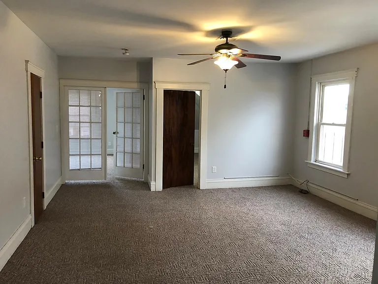 Living room and bedrooms with new wall paint.