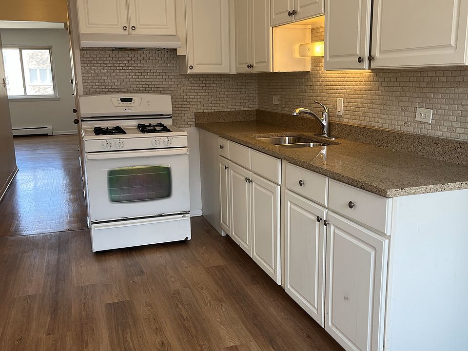 Kitchen with NEW granite countertop, floor and sink
