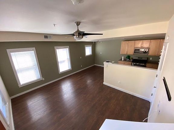 Living room and dining room. Disclaimer: Before being painted.