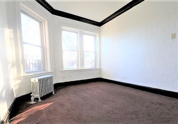 2nd image of 10642 S Avenue C APT 1F