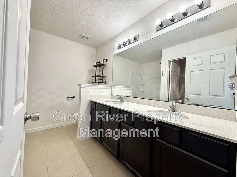 8704 Lake George Cir W — Photo 23