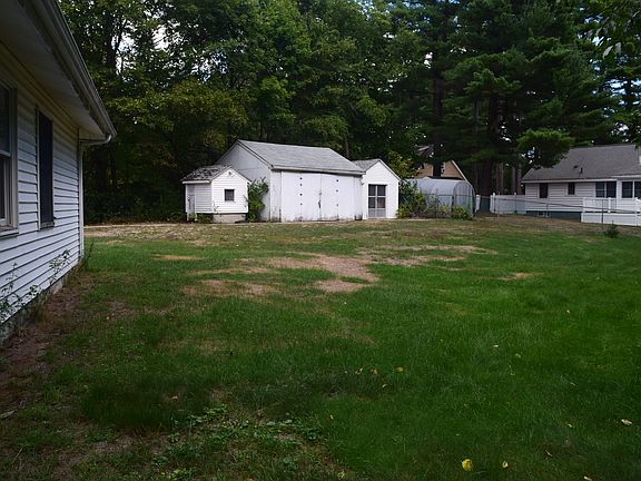 Garage and 2 sheds
