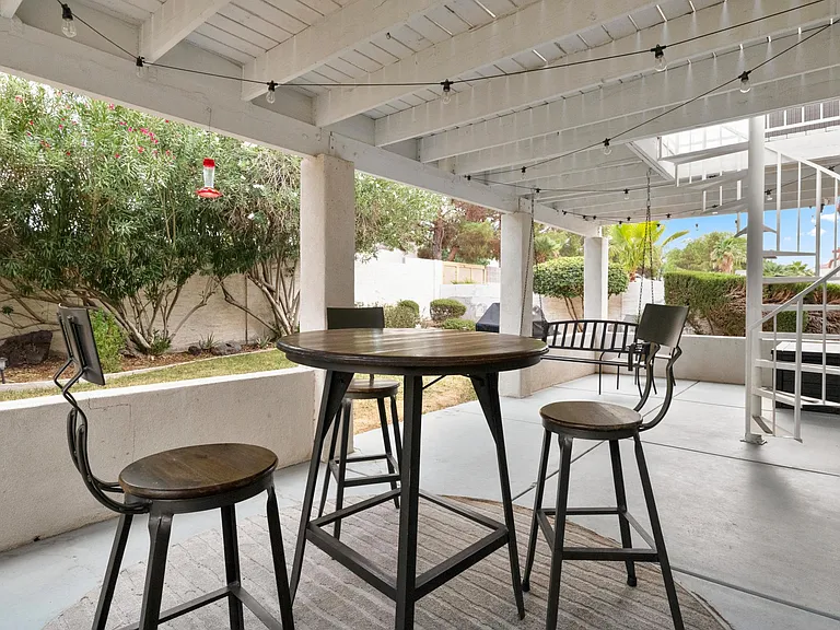 Lower patio adjacent to the living area and kitchen