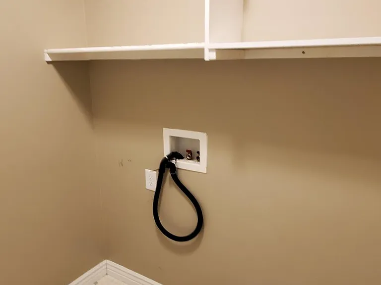 Laundry hook ups, mud room, access to garage