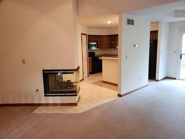 Family room--love that see-through gas fireplace!